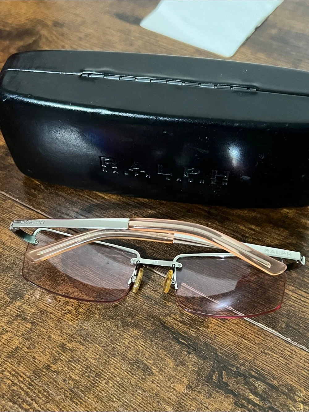 Ralph Lauren women’s Brown-Tinted Rimless Sunglasses pink
